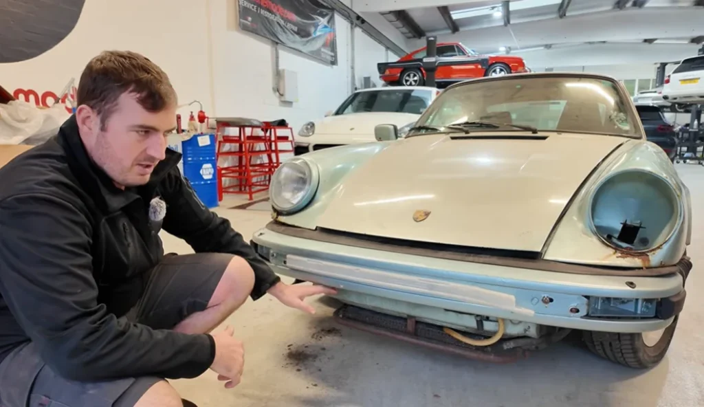 Man opens shipping container to discover Porsche 911 that's been hiding for 16 years so he checks its condition