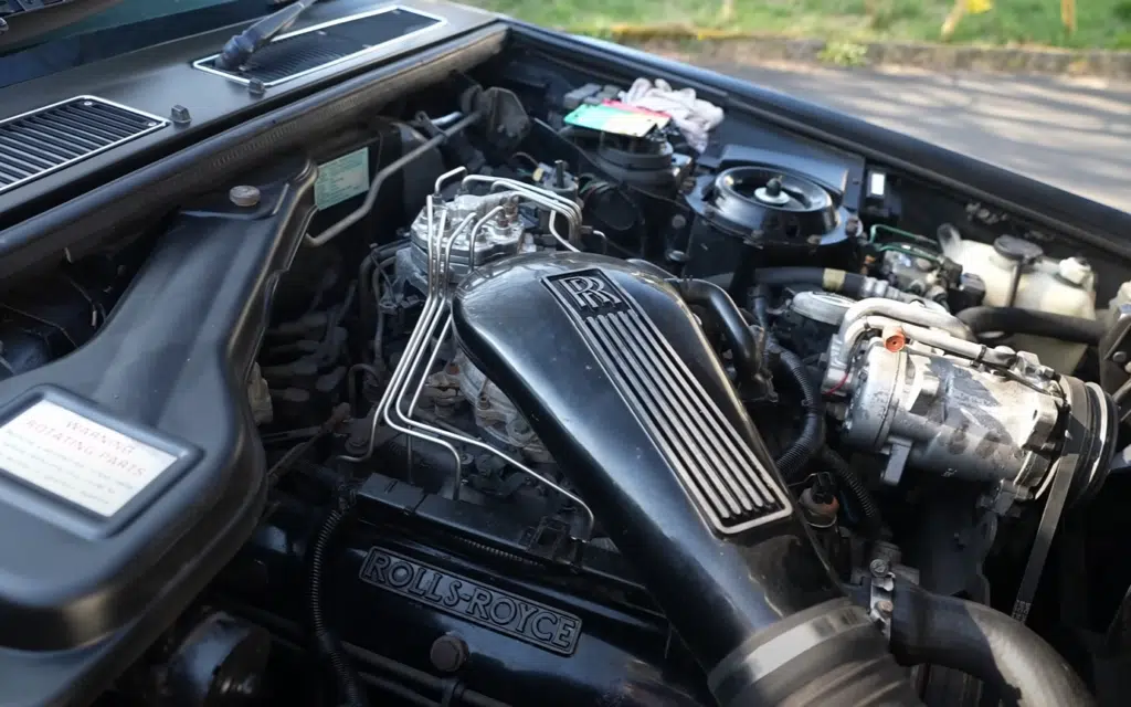 A cathedral of a Rolls-Royce tackles Nürburgring as a pro racer drive shows off old-school brakes, vintage suspension setup, and massive curb weight challenges