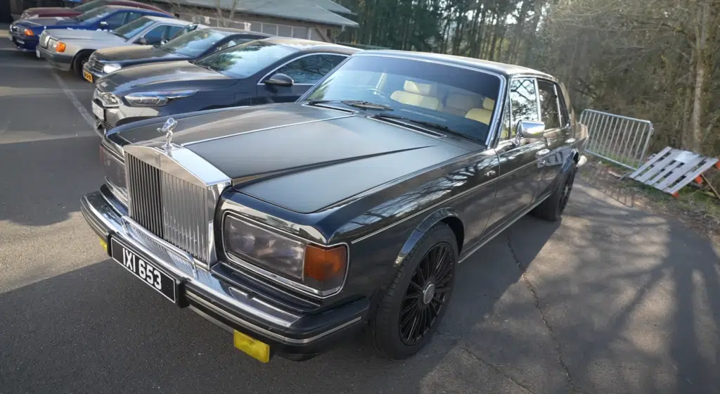 A cathedral of a Rolls-Royce tackles Nürburgring as a pro racer drive shows off old-school brakes, vintage suspension setup, and massive curb weight challenges
