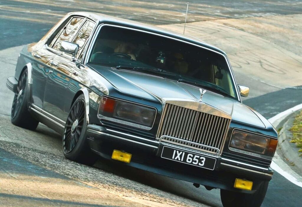 A cathedral of a Rolls-Royce tackles Nürburgring as a pro racer drive shows off old-school brakes, vintage suspension setup, and massive curb weight challenges