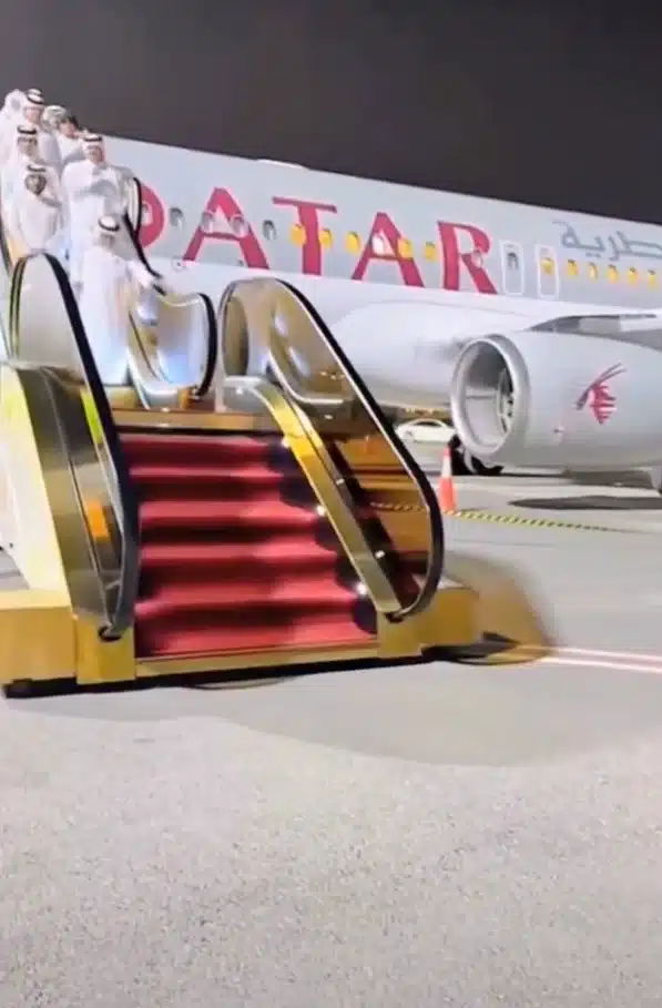 A gold-plated escalator is how Qatari royals step off their flying palace
