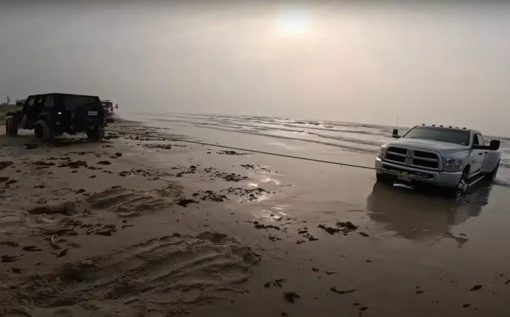 This RAM 3500 in Texas decided to go for a swim on a Brazoria County beach, but it didn't go well