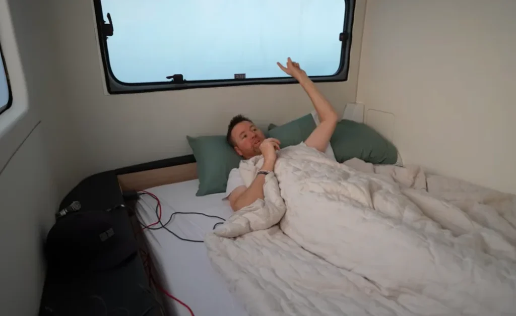 Man who was first person in the world to sleep in a Cybertruck takes the Tesla camping with an electric RV to see which is better
