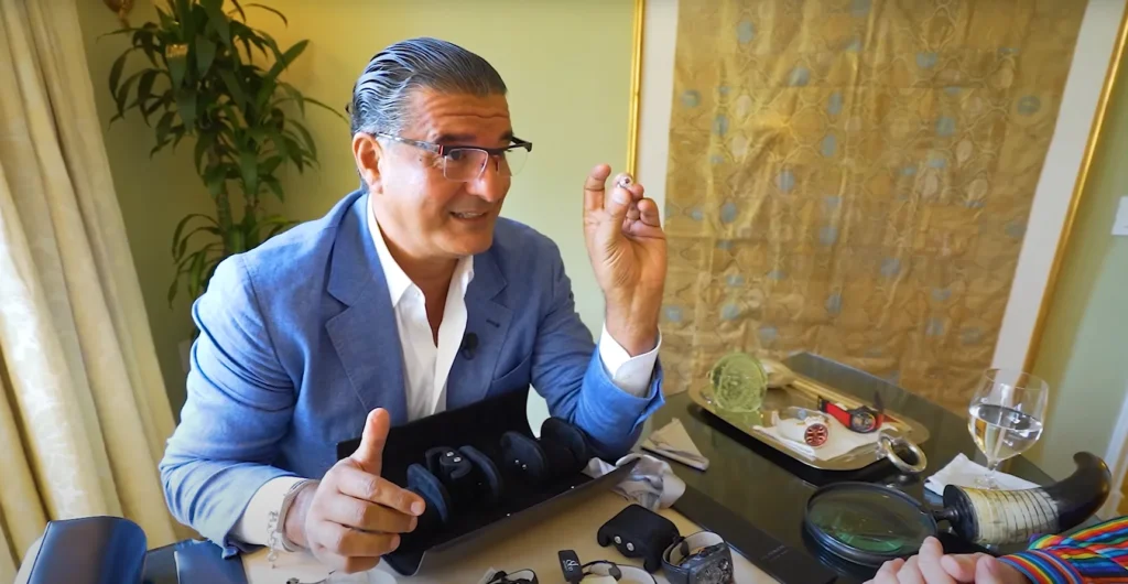Man stunned to find out true value of red diamond earring he's casually wearing that he bought for less than $1M