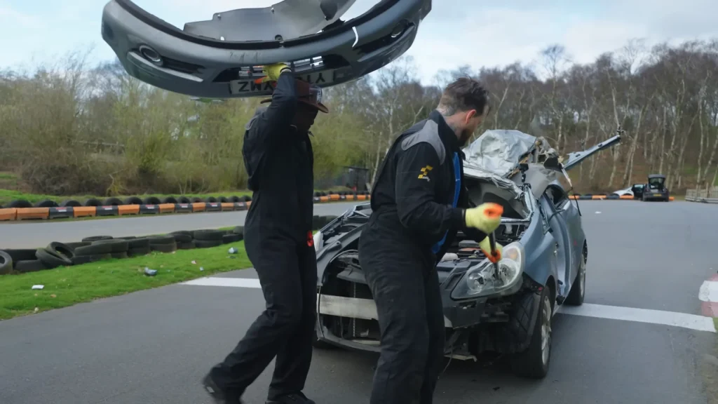 Men keep removing parts from a car to see at what point a Vauxhall becomes undriveable and they end up very surprised