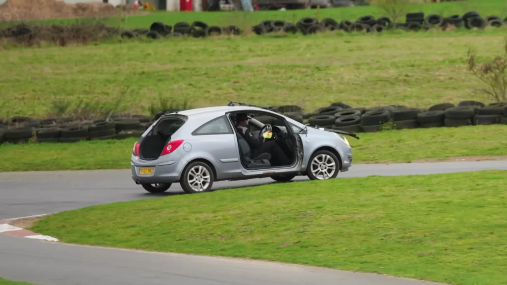 Men keep removing parts from a car to see at what point a Vauxhall becomes undriveable and they end up very surprised