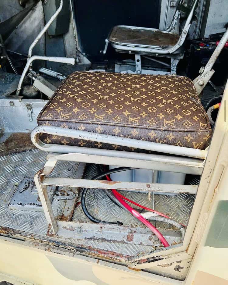 A Louis Vuitton leather covered seat in the armored vehicle.