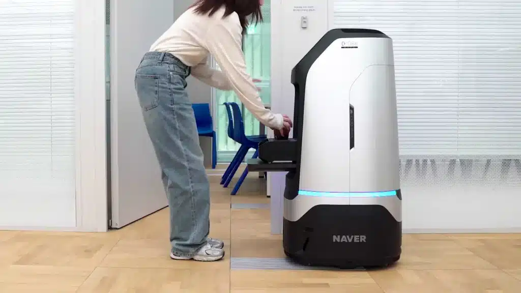 Person receiving order from robot
