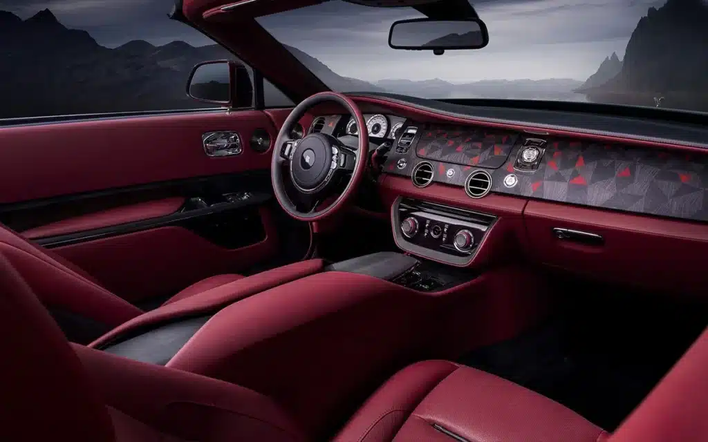 The new $30m Rolls-Royce Droptail named La Rose Noire is a crimson V12 embedded with petals that includes a bespoke Audemars Piguet luxury watch