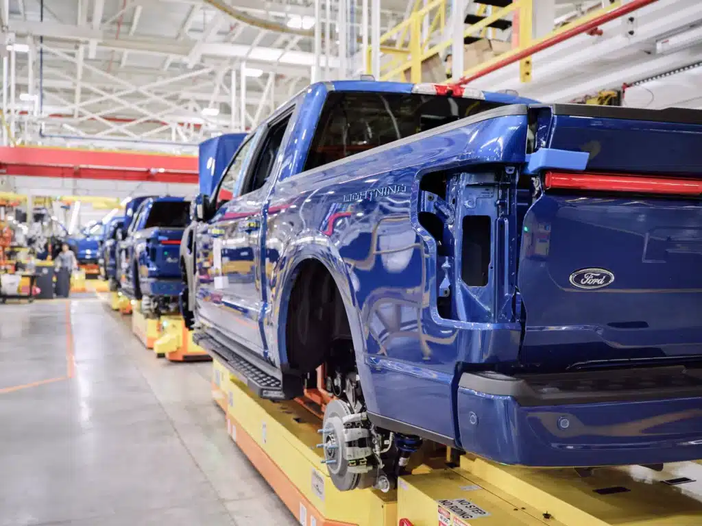 Ford model T legacy drives a Ford redesign in electric vehicles as Tesla competition forces the automaker to cut losses and rethink production