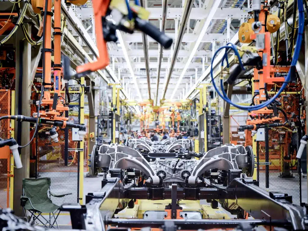 Ford model T legacy drives a Ford redesign in electric vehicles as Tesla competition forces the automaker to cut losses and rethink production