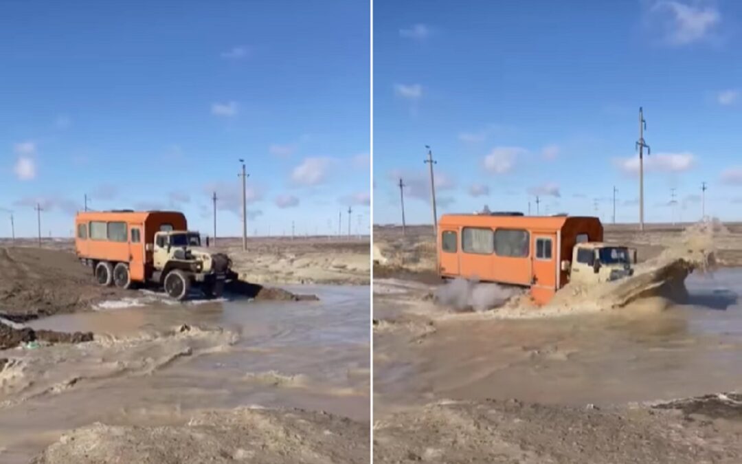 Russian bus driver attempts to cross a river, regrets it immediately
