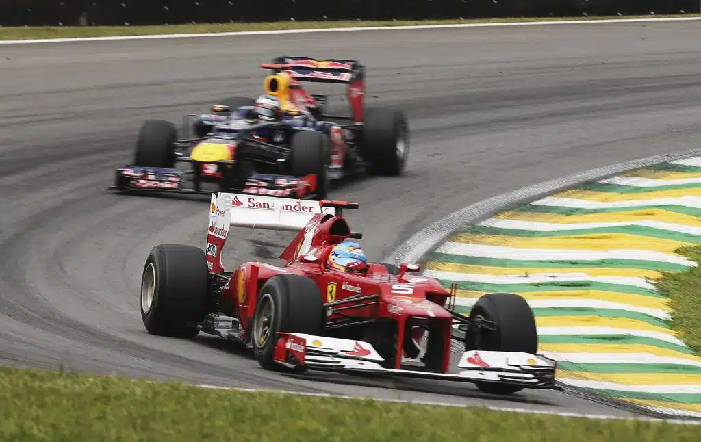 Fernando Alonso of Spain and Ferrari drives ahead of Sebastian Vettel of Germany and Red Bull Racing during the final practice session prior to qualifying for the Brazilian Formula One Grand Prix at the Autodromo Jose Carlos Pace on November 24, 2012 in Sao Paulo, Brazil.