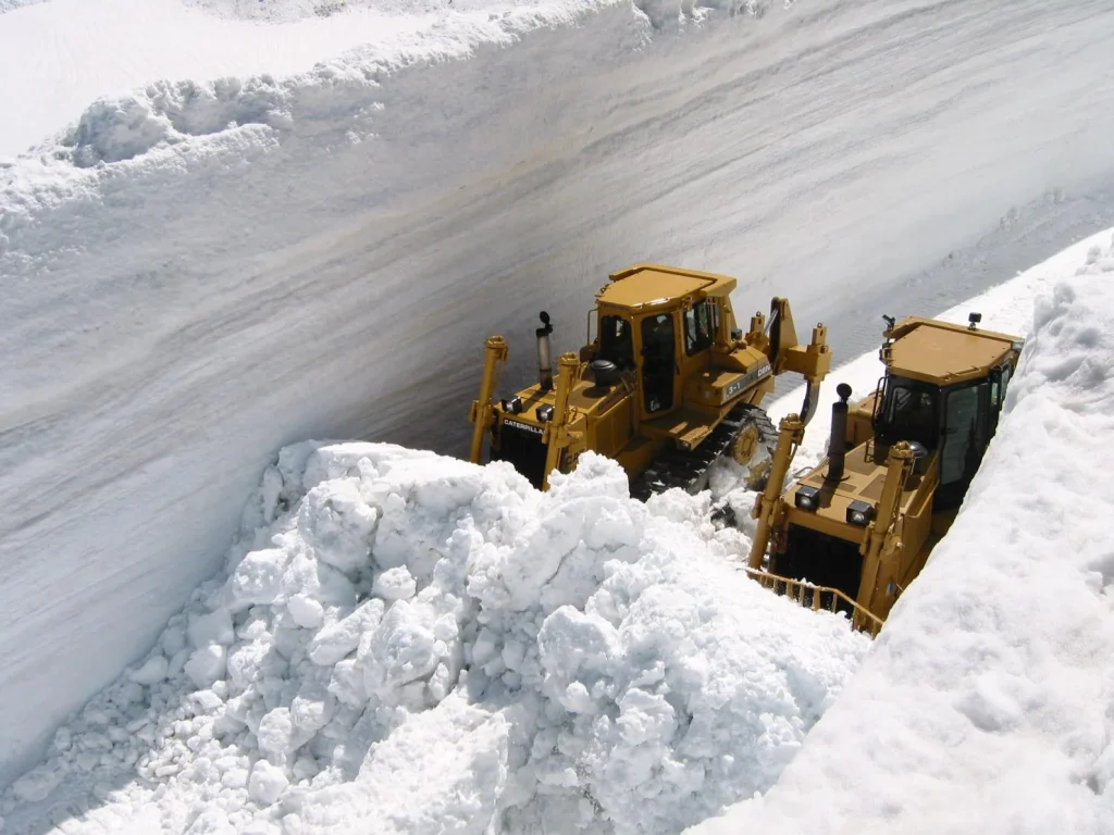 Street in Japan swallowed by 65 feet of snow as crews carve way through to reopen road