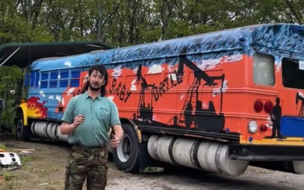 Dads driving American school bus from New York to Los Angeles