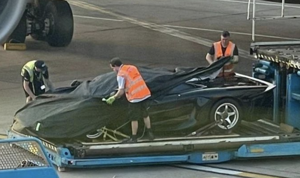 the Sultan of Brunei's McLaren F1 GT being unwrapped in London prior to its restoration 