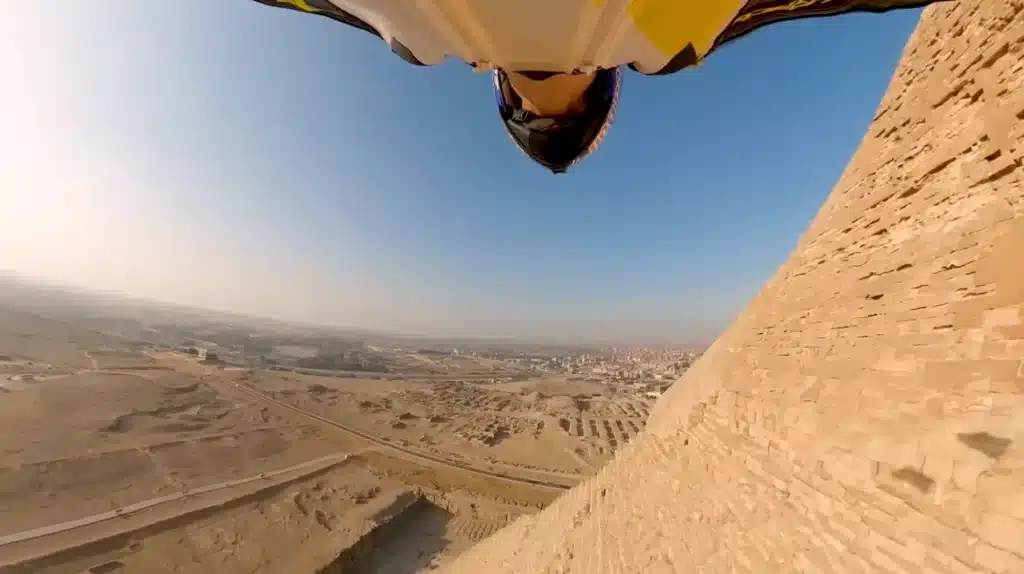 Man undertakes wingsuit dive at unprecedented proximity to Giza's Pyramids