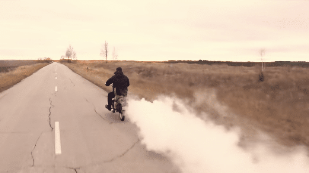 Lexa's steam-powered motorbike can hit 60kph. Credit: YouTube/@Lexa_Romantik