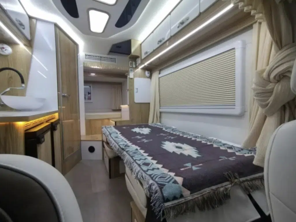 Spectacular motorhome can transform to have an upstairs and a terrace