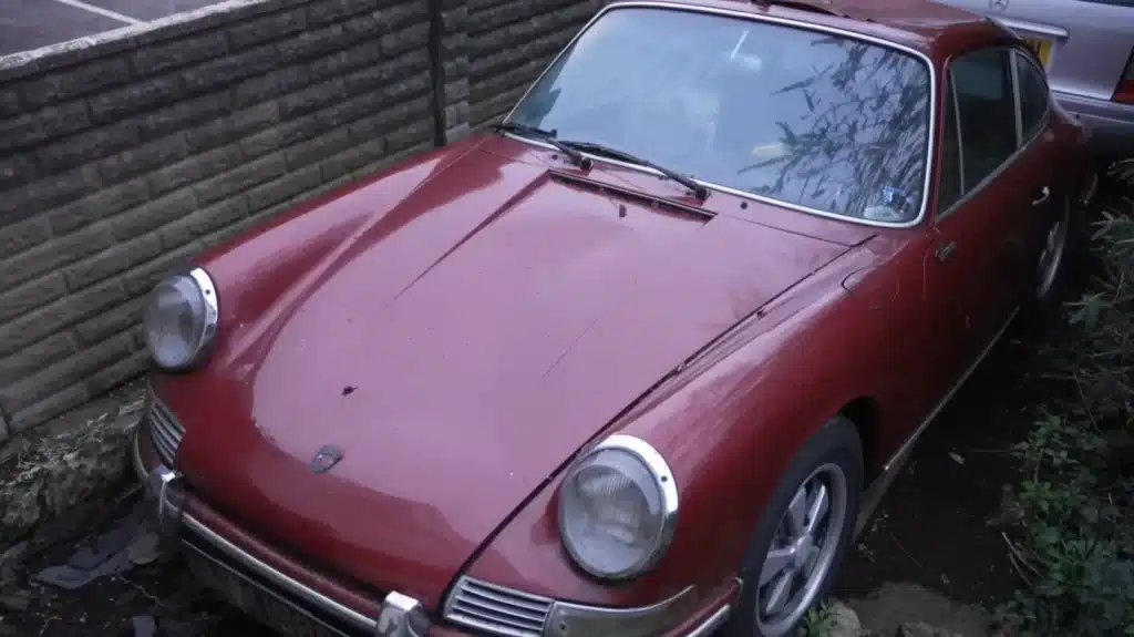 Secret garden full of abandoned and overgrown classic cars