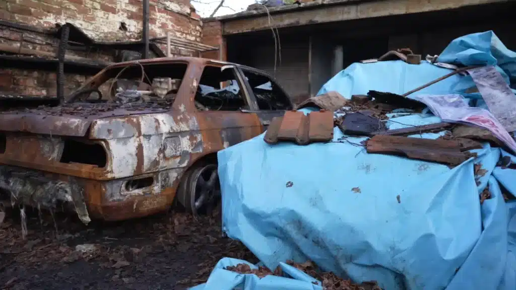 Secret garden full of abandoned and overgrown classic cars