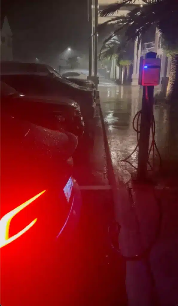 Tesla seen charging as Hurricane Milton rages around it