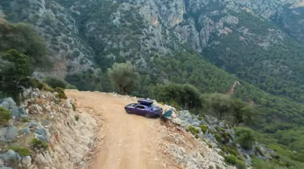 Man traveling the world in Dodge Challenger on an adventure