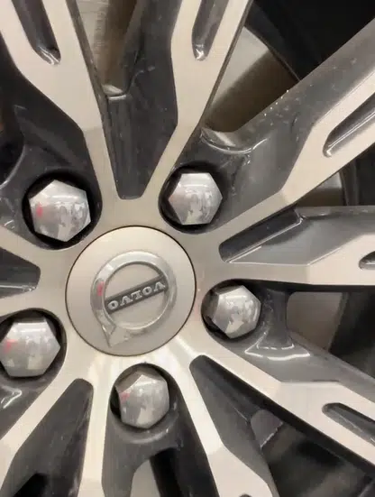 A mechanic was left baffled after spotting something strange firmly attached to the wheel of a Volvo she was working on, and turned to the internet for advice