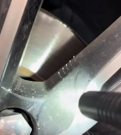 A mechanic was left baffled after spotting something strange firmly attached to the wheel of a Volvo she was working on, and turned to the internet for advice