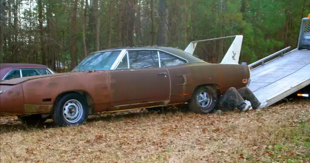 Father and son wait decades for Plymouth Superbird after hearing urban legend a scary man in town had one