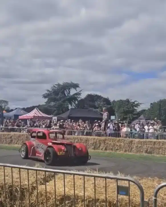 Man gets out of car while drifting at Santa Pod Ultimate Street Car show