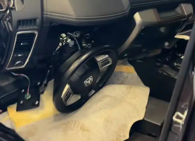 A mechanic apprentice turned a simple oil change on a RAM truck into a full dashboard removal after dropping a single bolt