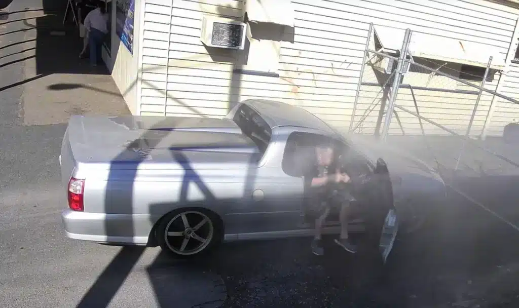 Man delivers instant karma with his sprinklers for any drivers who try and park in his shop's driveway