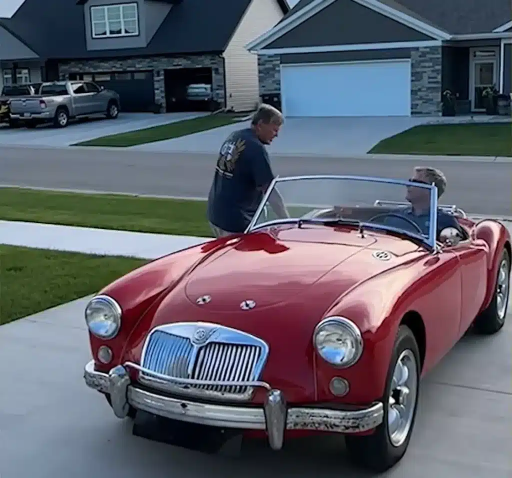 Family bring grandfather to tears of joy after surprising him by fixing up his beloved 1956 MG sports car