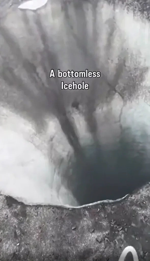 Alaskan helicopter pilot shows off freaky 'bottomless' holes in melting glaciers