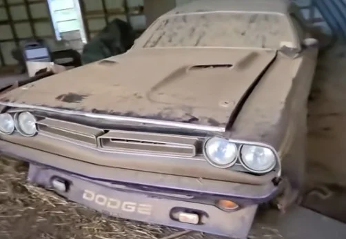 A Plum Crazy Dodge Challenger wagon barn find has resurfaced after decades, a unique muscle car custom build known as the Plum Crazy Hauler