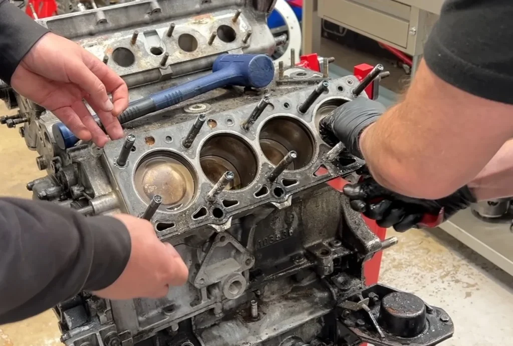 A cheap Ferrari 308 project uncovered seized heads and hidden damage, forcing a full engine rebuild and turning it into a major restoration