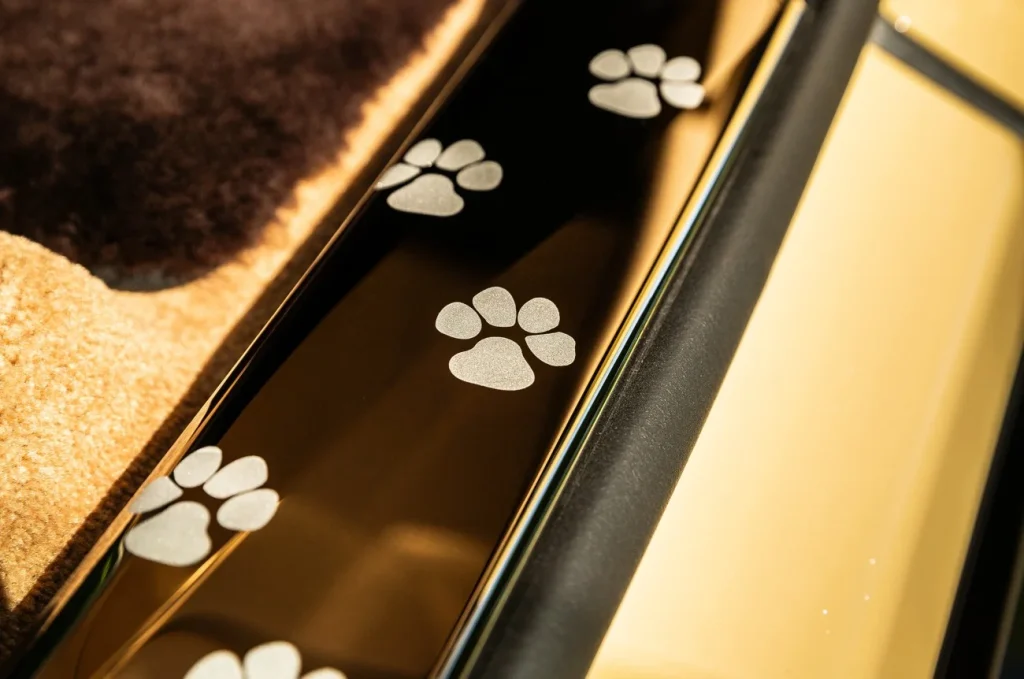 The custom Rolls-Royce Spectre Bailey is a bespoke commission that honors a Labrador-Golden Retriever mix with handcrafted detail