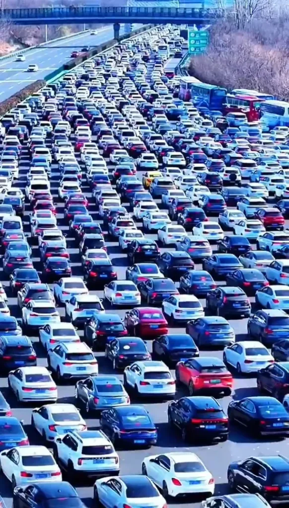 Beijing's '50-lane highway' turns into a sea of cars as traffic reaches unprecedented levels