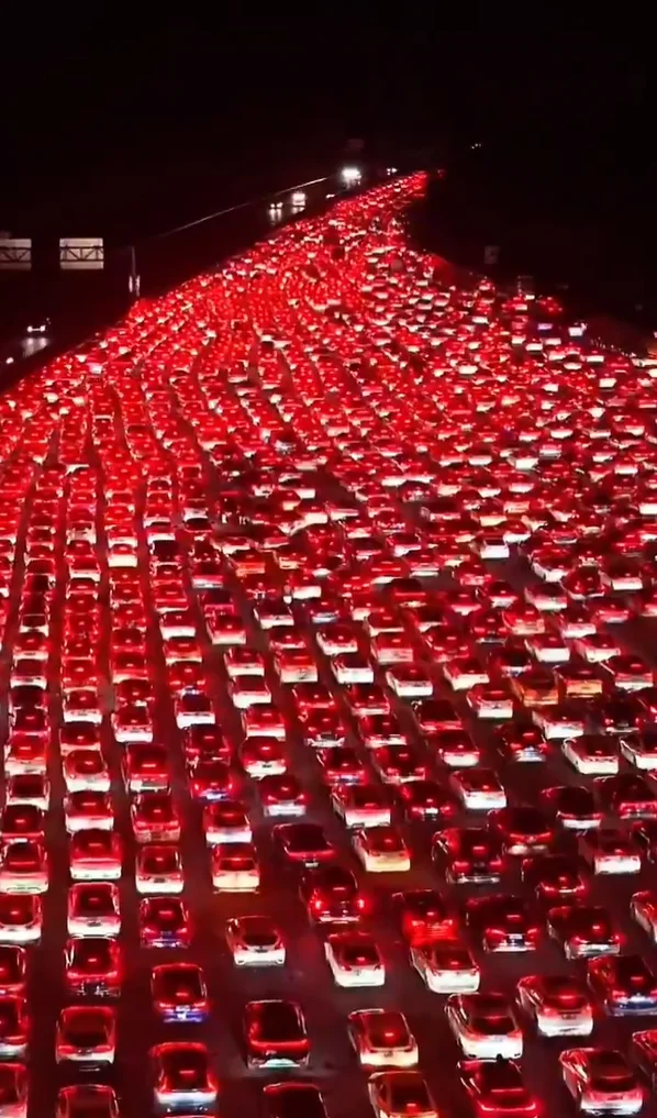 Beijing's '50-lane highway' turns into a sea of cars as traffic reaches unprecedented levels