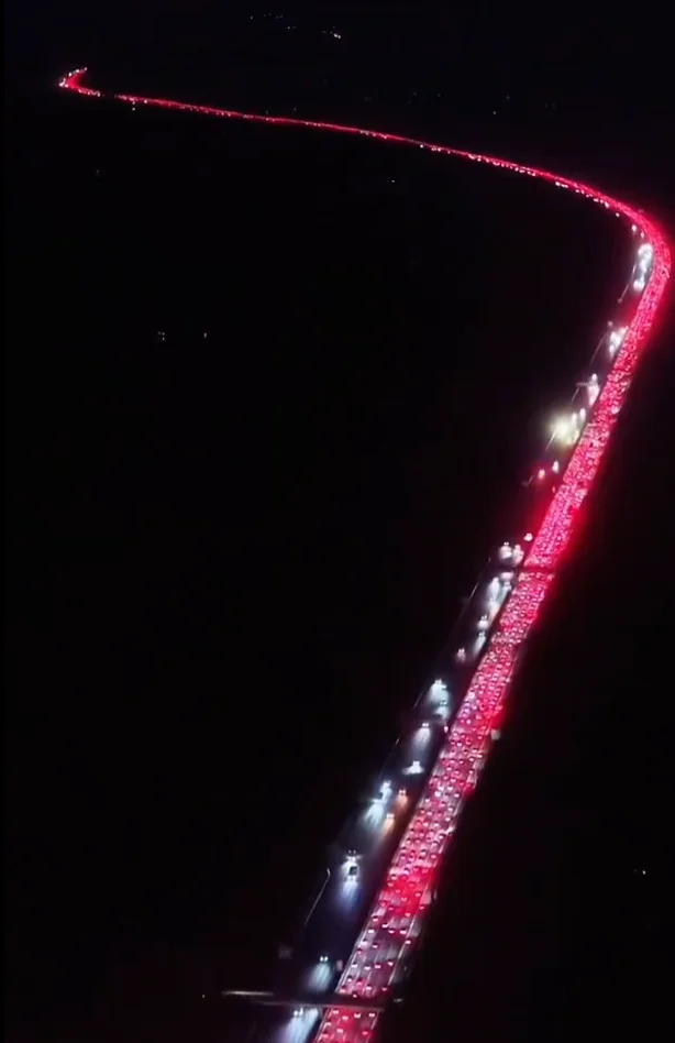 Beijing's '50-lane highway' turns into a sea of cars as traffic reaches unprecedented levels