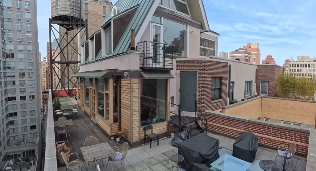 This US architect built a $200,000 home on top of a NYC skyscraper, turning a janitor’s apartment into a rooftop chalet he’s lived in for 28 years