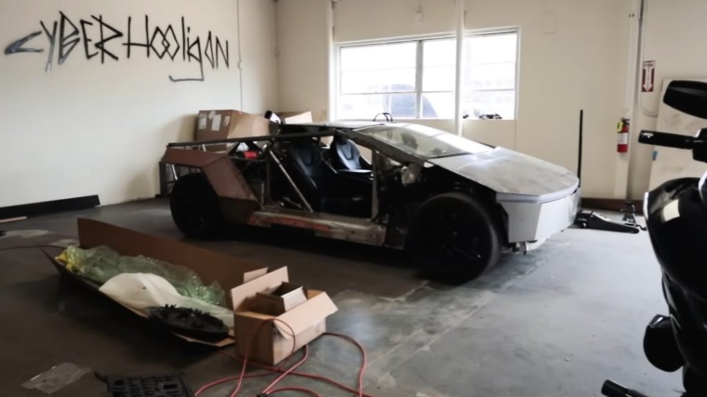 This custom Cybertruck inspired Tesla project successfully merges the high performance of a Model S Plaid with raw stainless steel panels for a unique look