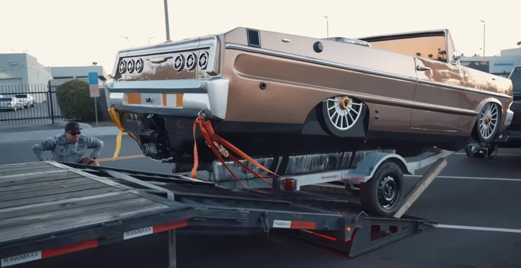 Shaq surprises people who were building his Impala boat with expensive custom jewelry during visit