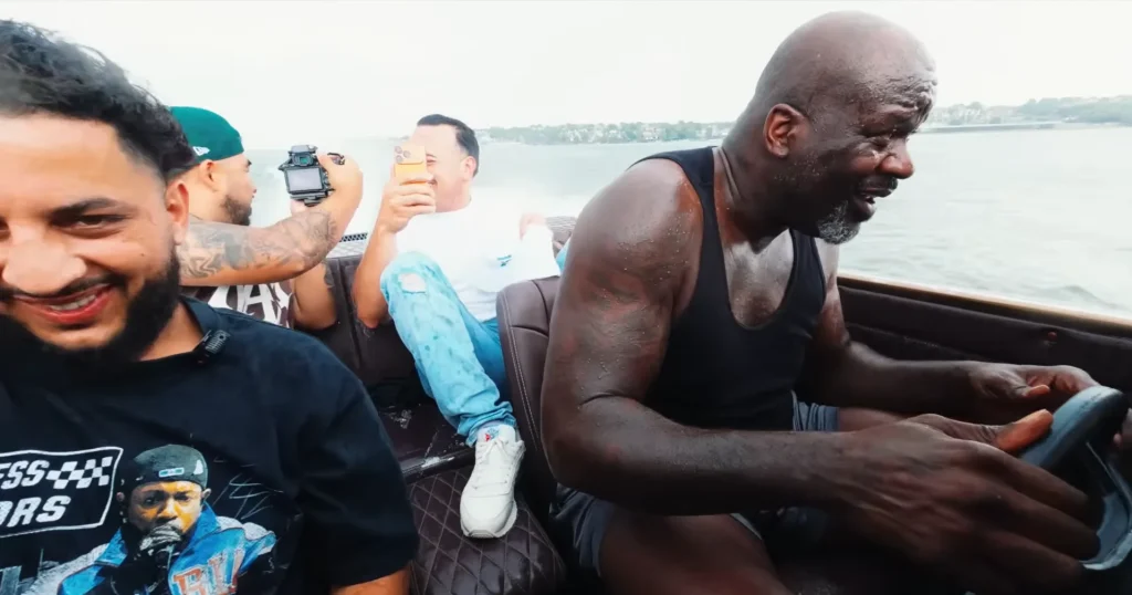 Shaq surprises people who were building his Impala boat with expensive custom jewelry during visit