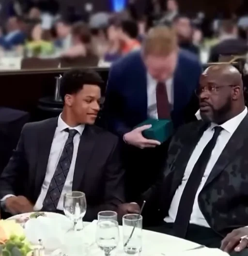 Shaquille O'Neal goes to an auction just to help drive up the price but it backfires as he accidentally buys his son a Rolex