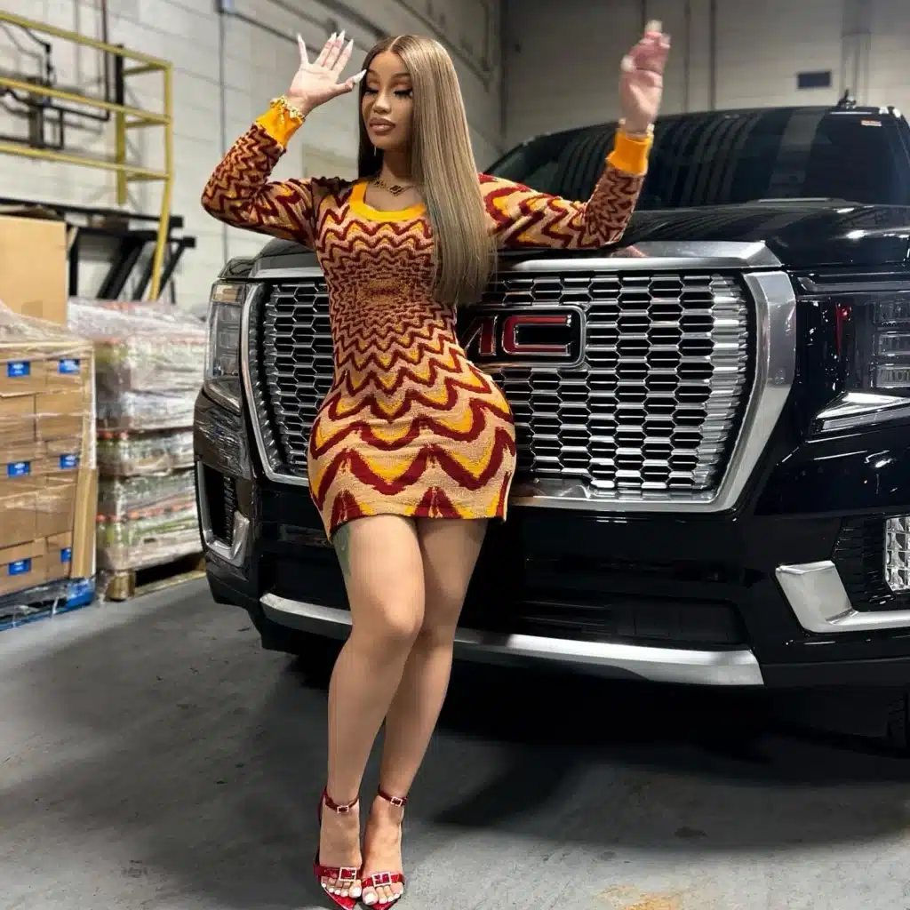 Cardi B with her car