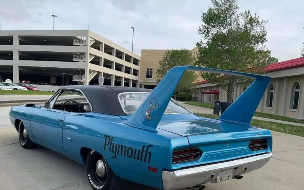 Reconizable Plymouth Superbird muscle car sold at a cut price