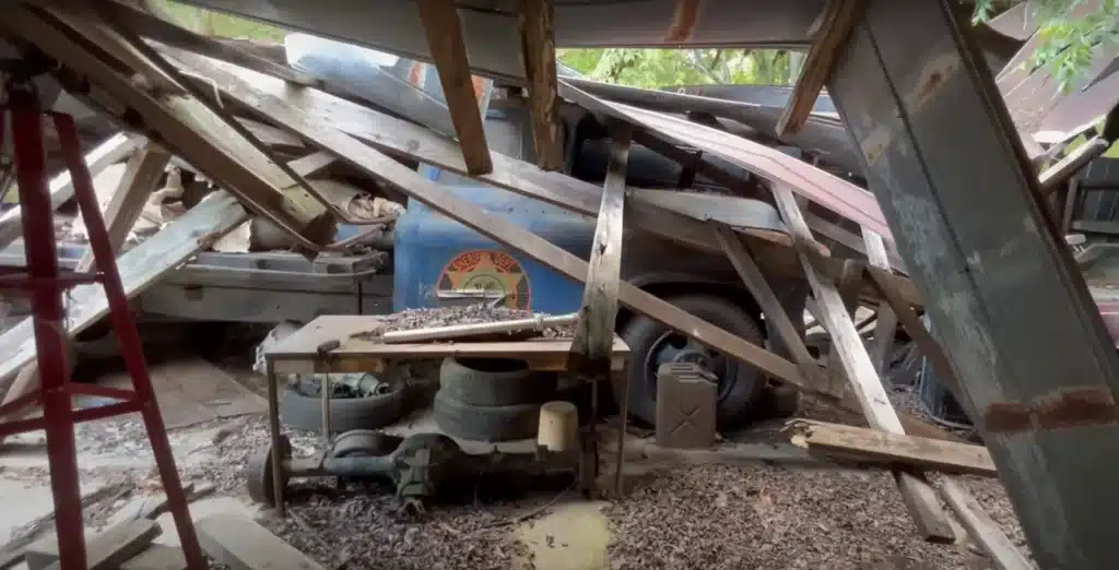 Georgia barn collapses on what looks to be a Sheriff's truck, but is something else entirely