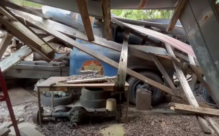 Georgia barn collapses on what looks to be a Sheriff's truck, but is something else entirely